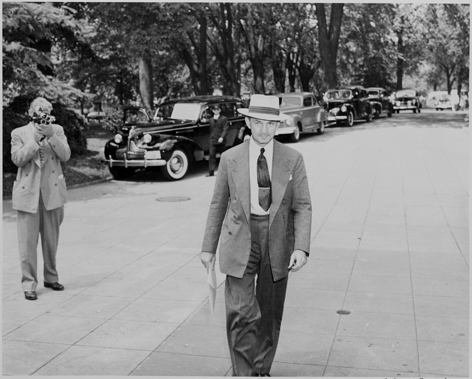 Photograph of Secretary of the Navy James Forrestal, evidently arriving at the White House for a Cabinet meeting. - NARA - 199141