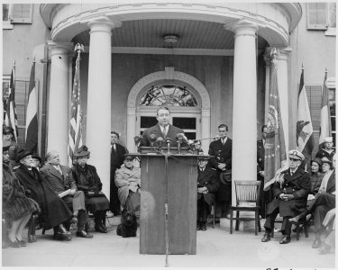 Photograph of Secretary of the Interior Julius Krug speaking at the dedication of Franklin D. Roosevelt's home at... - NARA - 199359