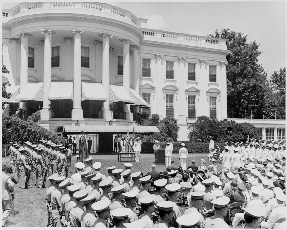 Photograph of the ceremony on the South Lawn of the White House at which President Truman awarded Presidential Unit... - NARA - 199406