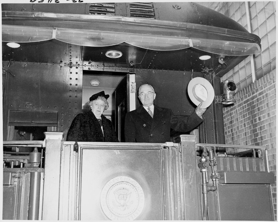 Photograph of the President and Mrs. Truman on the rear platform of the President's railroad car, the Ferdinand... - NARA - 200253