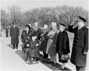 Photograph of the President and Mrs. Truman, with Adelaide Johnson (in wheelchair), a 104-year-old Washington artist... - NARA - 200272