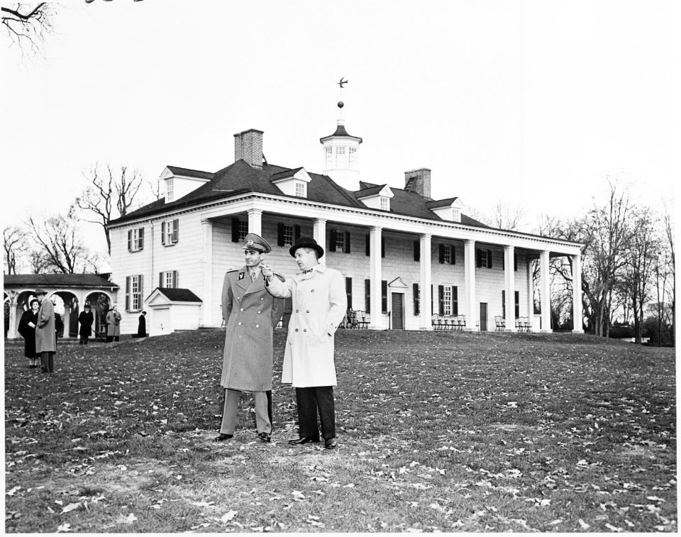 Photograph of the Shah of Iran outside George Washington's home, during his tour of Mount Vernon. - NARA - 200147