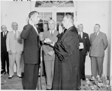 Photograph of Tom Clark being sworn in as an Associate Justice of the United States Supreme Court by Chief Justice... - NARA - 200161