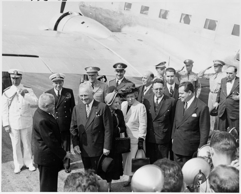 Photograph of the President and Mrs. Truman greeting President Eurico Dutra of Brazil at the airport in Washington... - NARA - 200120