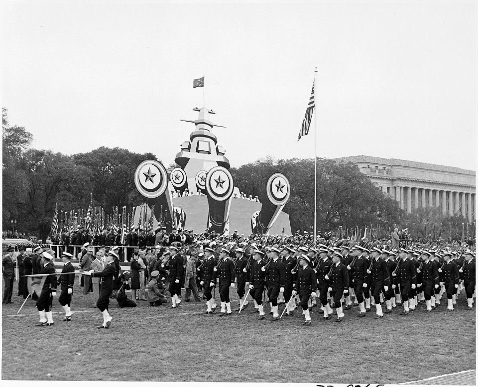 Photograph of troops marching at ceremonies honoring Admiral Chester Nimitz. - NARA - 199219