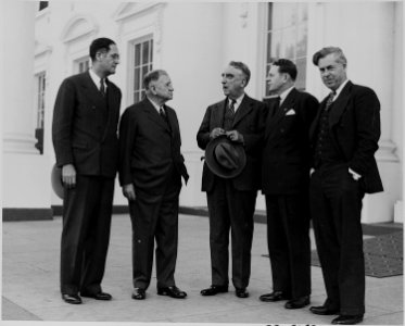 Photograph of Truman administration officials outside the White House, evidently on occasion of welcoming ceremonies... - NARA - 199241