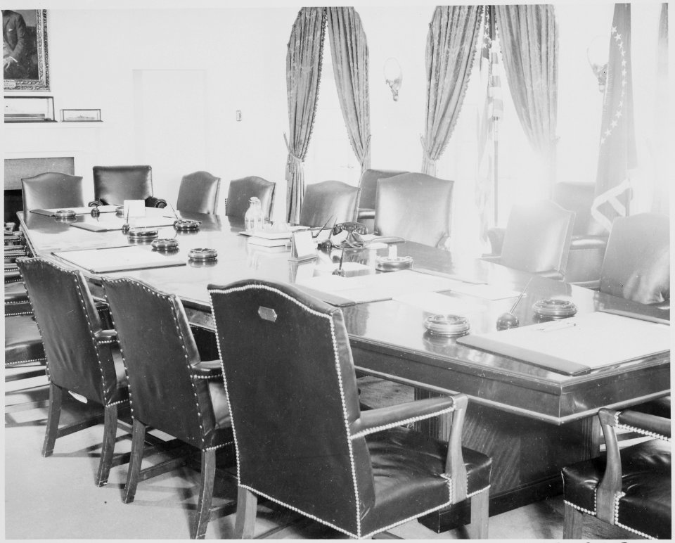 Photograph of the table and chairs in the Cabinet Room of the White House. - NARA - 199450