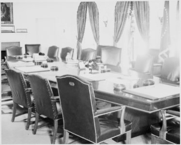 Photograph of the table and chairs in the Cabinet Room of the White House. - NARA - 199450