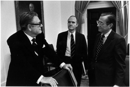 Photograph of Vice President Nelson A. Rockefeller, Brent Scowcroft, and William Colby Discussing the Situation in... - NARA - 186797