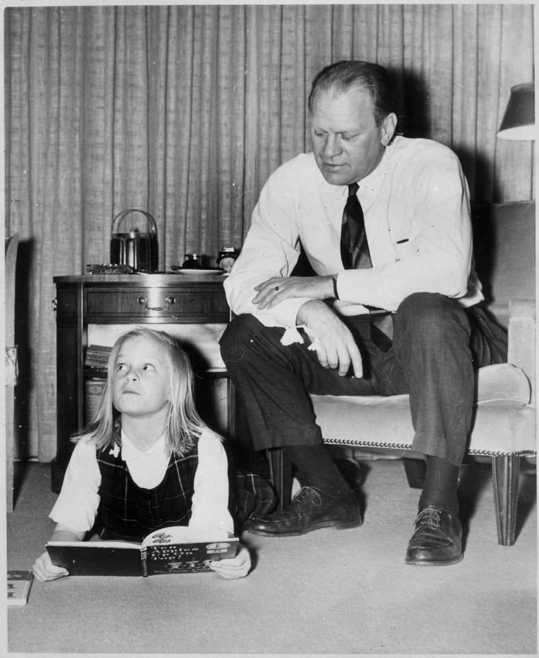 Photograph of Representative Gerald R. Ford with his Daughter Susan in the Living Room of their Alexandria, Virginia... - NARA - 187005