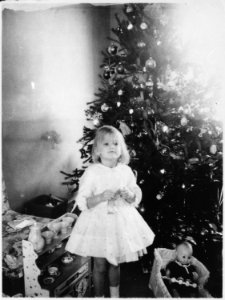 Photograph of Susan Ford (the Daughter of Gerald and Betty Ford) in Front of the Christmas Tree at the Ford Residence... - NARA - 187045