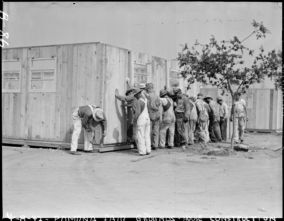 Pomona, California. Workmen erecting barracks for evacuees of Japanese ancestry at assembly center . . . - NARA - 536835