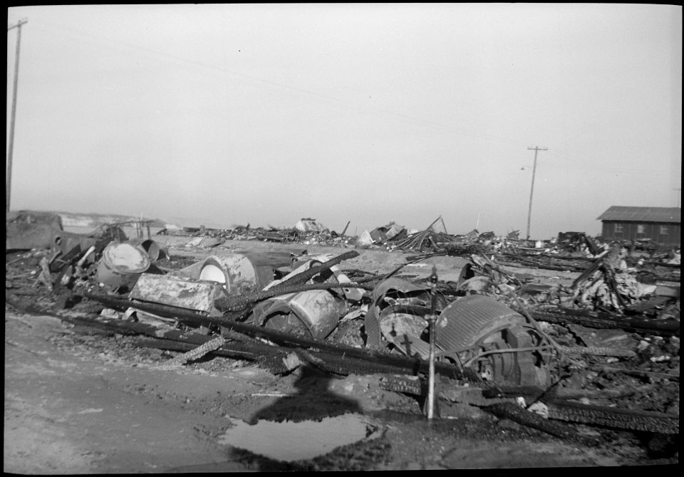 Poston, Arizona. 46 electric washing machines were destroyed in a Christmas night 1943 blaze in blo . . . - NARA - 539519