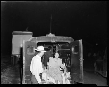 Poston, Arizona. Arrival of young evacuee cripple of Japanese ancestry by ambulance to this War Rel . . . - NARA - 536141