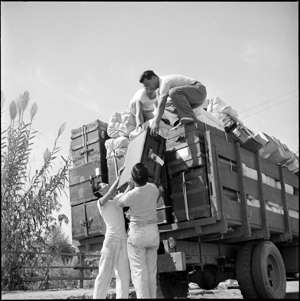 Poston, Arizona. Baggage of residents leaving from the Parker, Arizona Railroad Station is picked u . . . - NARA - 539862