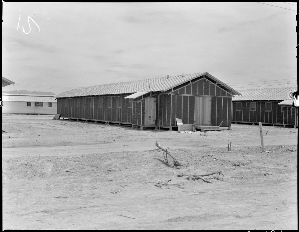 Poston, Arizona. Barrack building typical of those at this War Relocation Authority center for evac . . . - NARA - 536157