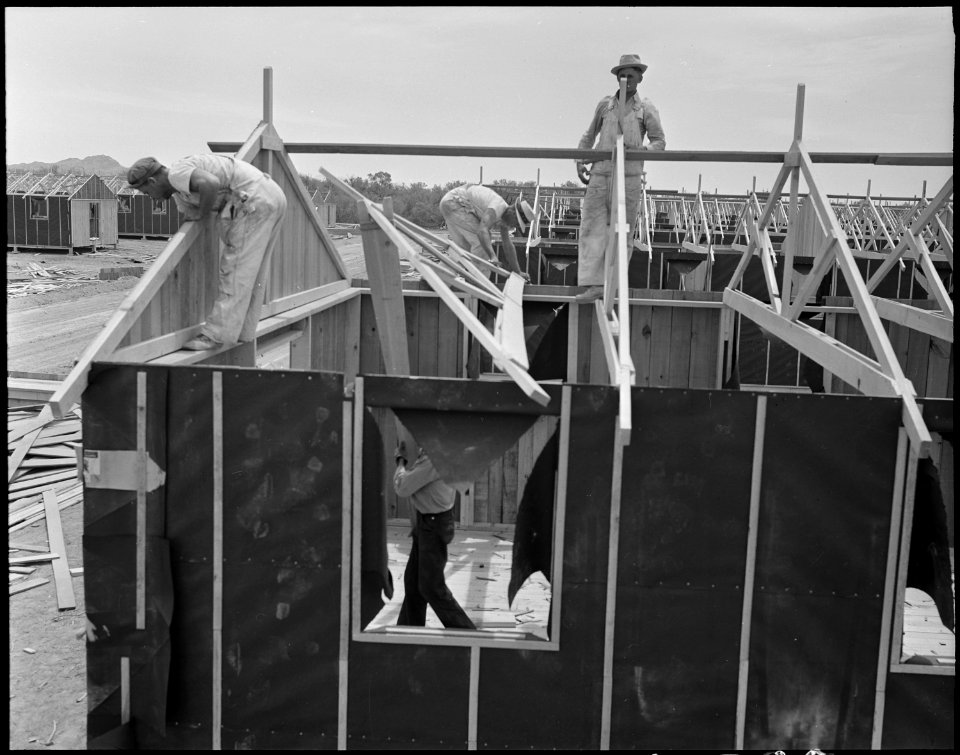 Poston, Arizona. Construction of living quarters for evacuees of Japanese ancestry is in full progr . . . - NARA - 536300