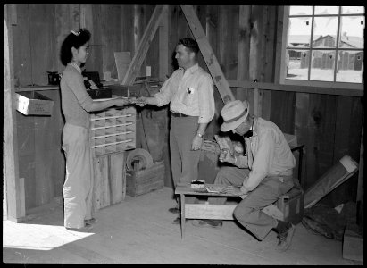 Poston, Arizona. First service at the newly established post office, Post, at the relocation center . . . - NARA - 537415
