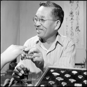 Poston, Arizona. Mr. Niseki- obtaining the correct size of the ring finger. Although most of the . . . - NARA - 539884