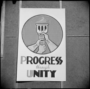 Poston, Arizona. New Years Fair. This symbol and the words  Progress Thru Unity were adopted by . . . - NARA - 536612