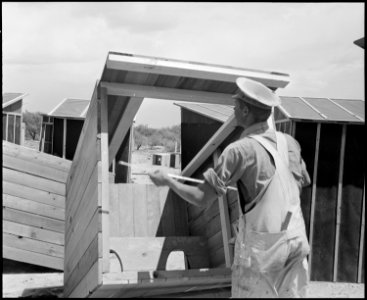 Poston, Arizona. Construction of out- buildings for construction employees. - NARA - 536318 photo