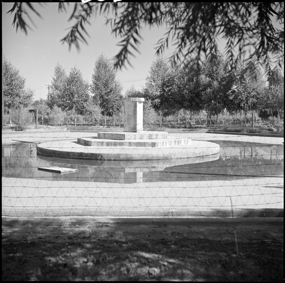 Poston, Arizona. No longer are there small children splashing about in the wading pool built for th . . . - NARA - 539858