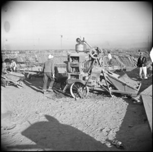 Poston, Arizona. School buildings. These school buildings are being erected by evacuee labor. The . . . - NARA - 536620