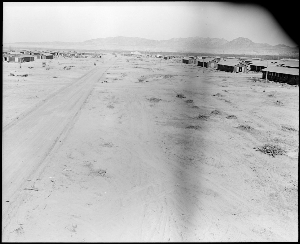 Poston, Arizona. Street scene at the relocation center for evacuees of Japanese ancestry. This is . . . - NARA - 536146