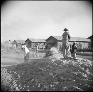 Poston, Arizona. School buildings. These school buildings are being erected by evacuee labor. The . . . - NARA - 536621 photo