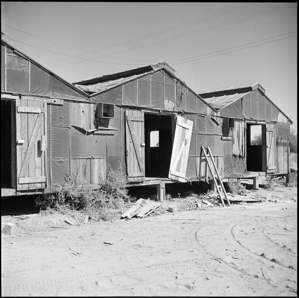 Poston, Arizona. Some of the blocks which were vacated earlier, are already dropping to pieces as . . . - NARA - 539857