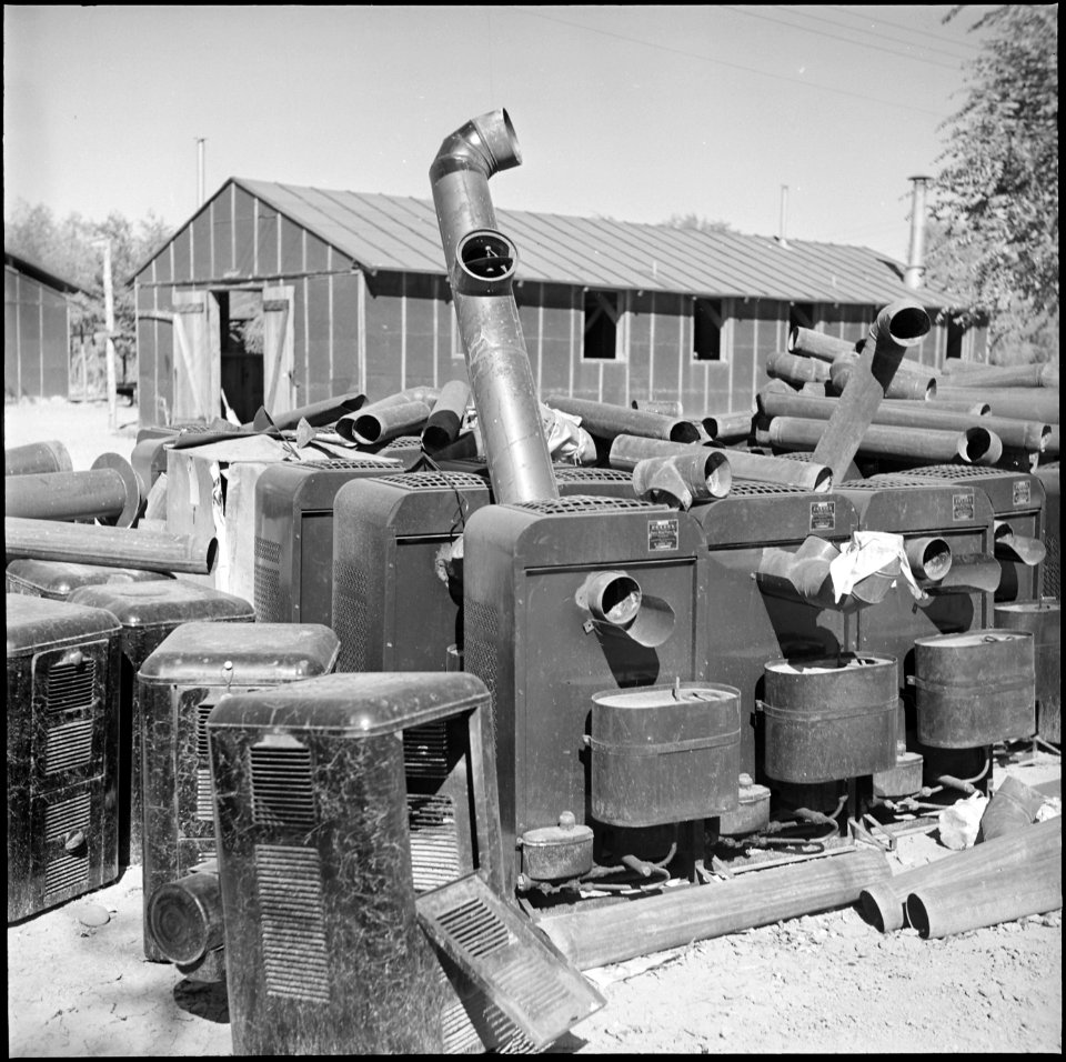Poston, Arizona. There will be no more need for these stoves in the barracks at Poston. Much of th . . . - NARA - 539863