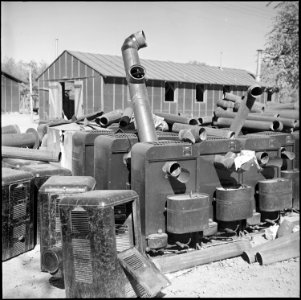 Poston, Arizona. There will be no more need for these stoves in the barracks at Poston. Much of th . . . - NARA - 539863