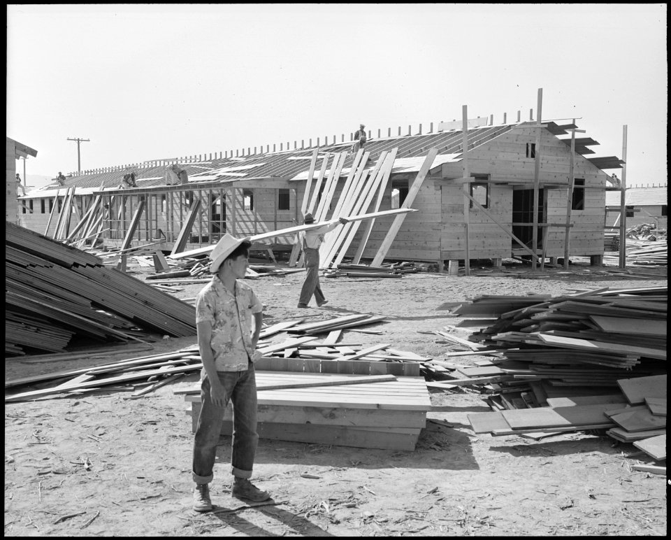 Poston, Arizona. Site Number 1. Larry Orida at the hospital being constructed at this War Relocati . . . - NARA - 536074
