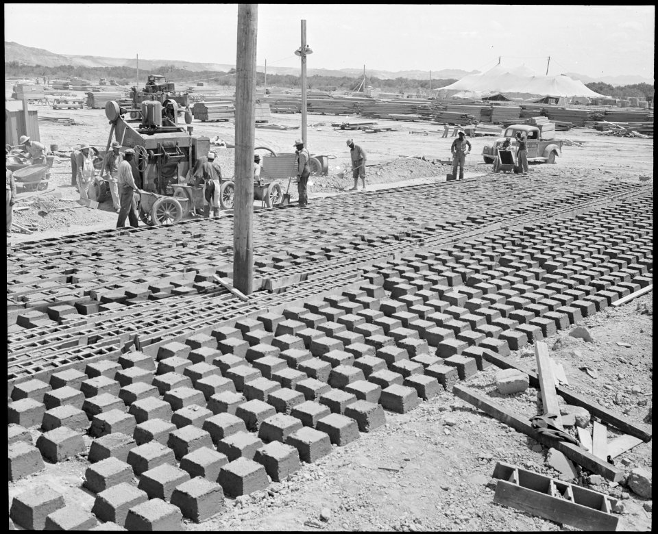 Poston, Arizona. Thousands of concrete blocks were cast foundations of new living quarters for evac . . . - NARA - 536274
