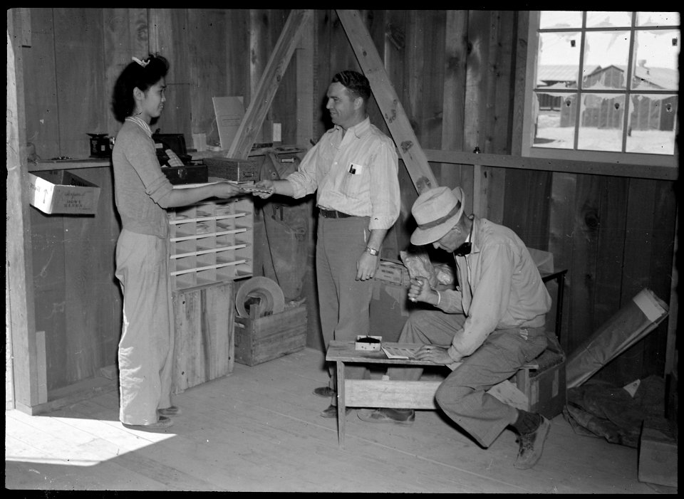 Poston, Arizona. First service at the newly established post office, Post, at the relocation center . . . - NARA - 537415