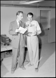 Poston, Arizona. Wade Head, project director with announcer Chet Huntley of CBS in a nationwide hoo . . . - NARA - 536284