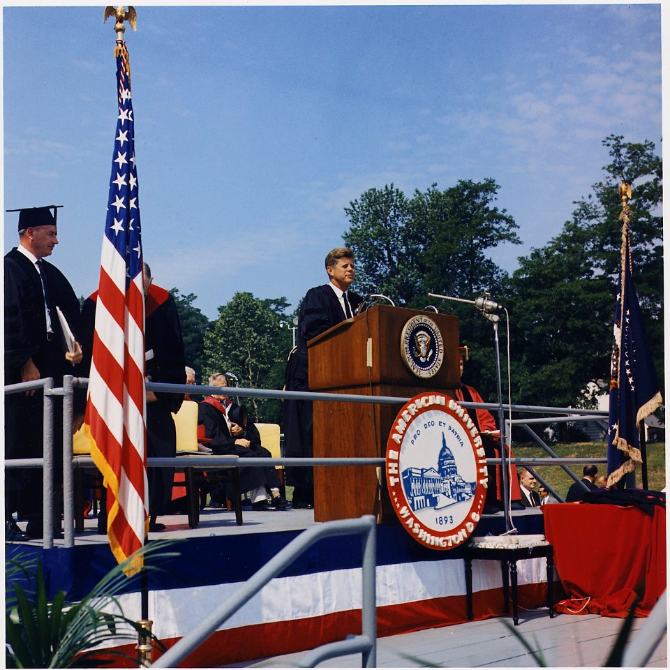 President addresses American University Commencement, receives honorary degree. President Kennedy at Podium... - NARA - 194263