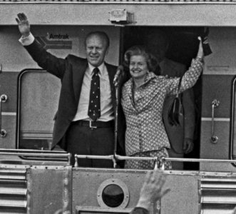 President and Mrs. Ford wave during their primary campaign in Michigan - NARA - 7027911 (cropped1)