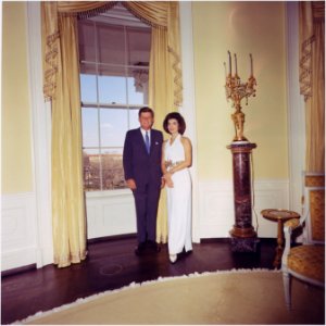 President and First Lady, Portrait Photograph. President Kennedy, Mrs. Kennedy. White House, Yellow Oval Room. - NARA - 194262 photo