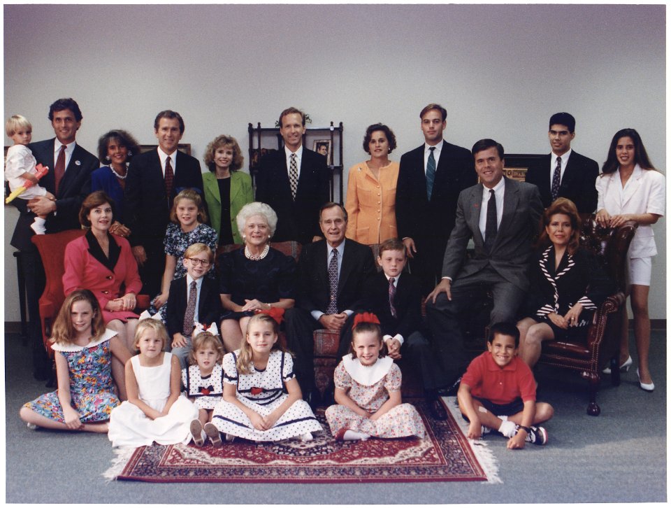 President and Mrs. Bush pose with their children, their spouses and grandchildren for a family portrait in Houston... - NARA - 186455