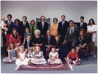 President and Mrs. Bush pose with their children, their spouses and grandchildren for a family portrait in Houston... - NARA - 186455 photo