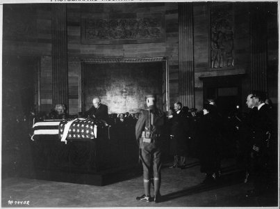 President Harding placing wreath of flowers on casket of Unknown Soldier in rotunda of the Capitol., 11-09-1921 - NARA - 530795