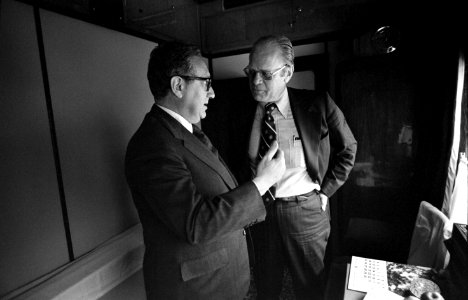 President Ford and Secretary of State Henry Kissinger confer on train - NARA - 7161383 photo
