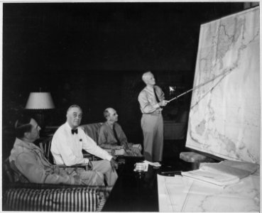 President Franklin D. Roosevelt in conference with General Douglas MacArthur, Admiral Chester Nimitz, and Admiral... - NARA - 520651