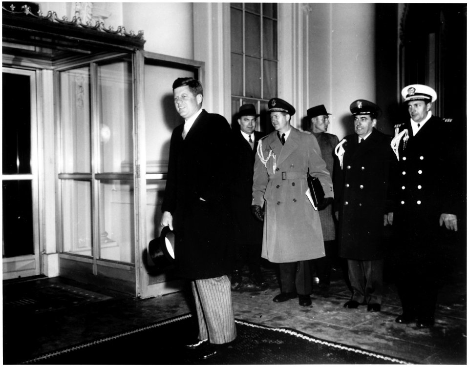 President Kennedy returns to the White House after attending Inaugural Balls. - NARA - 194185