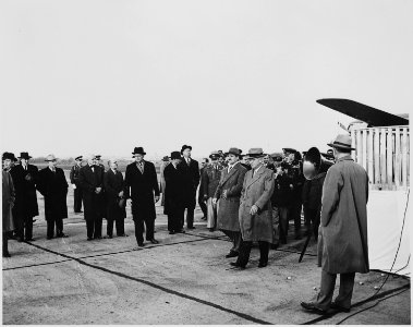 President Prio Socarras of Cuba and President Truman walking together at National Airport, Washington, D. C., where... - NARA - 200030 photo