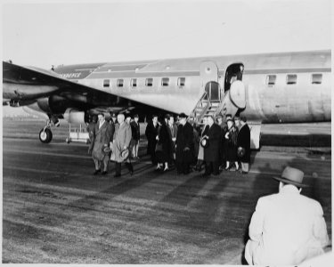 President Prio Socarras of Cuba walks with President Truman away from the presidential airplane Independence.... - NARA - 200034 photo
