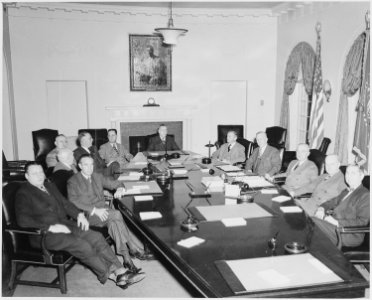 President Truman and his cabinet in the Cabinet Room of the White House. Clockwise around table from left, Secretary... - NARA - 199652 photo