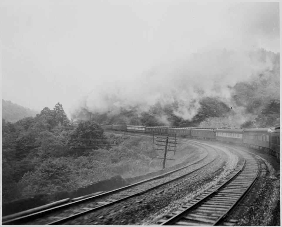 President Harry S. Truman's train. passing through the mountains and the clouds that cap them. President Truman was... - NARA - 199933