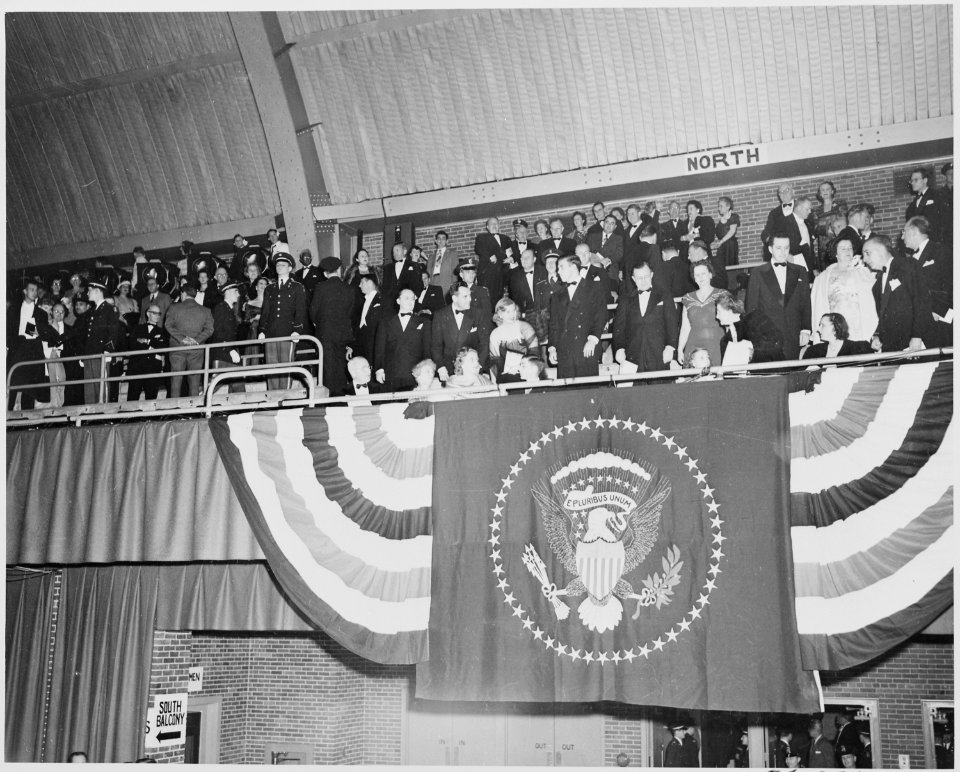 President Truman and his family seated in the bleachers at the inaugural gala at the National Guard Armory in... - NARA - 200000
